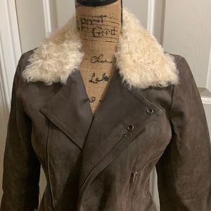 Moda International 100% leather jacket with 100% Wool trim. Worn one time.